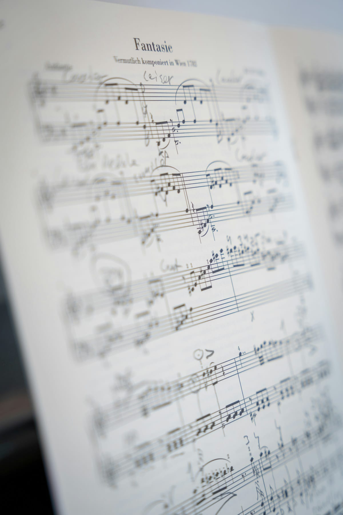 Close detail of printed music notation used to represent requirement planning